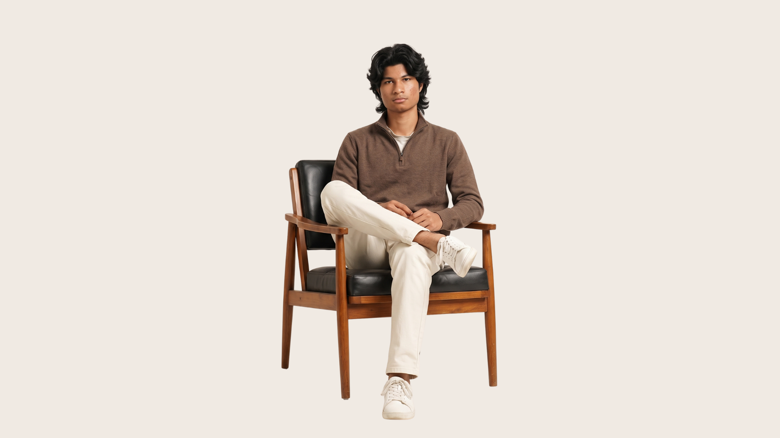 Vivek Singh Rajput seated in mid-century designer armchair